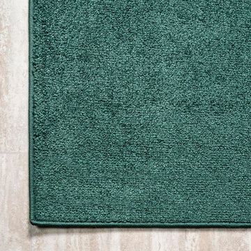 Haze Solid Low-pile Area Rug Emerald